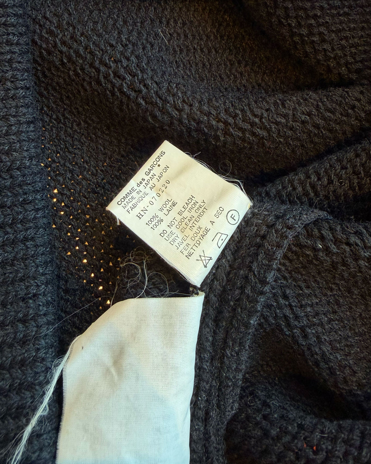Textured Sweater with Curved Hem